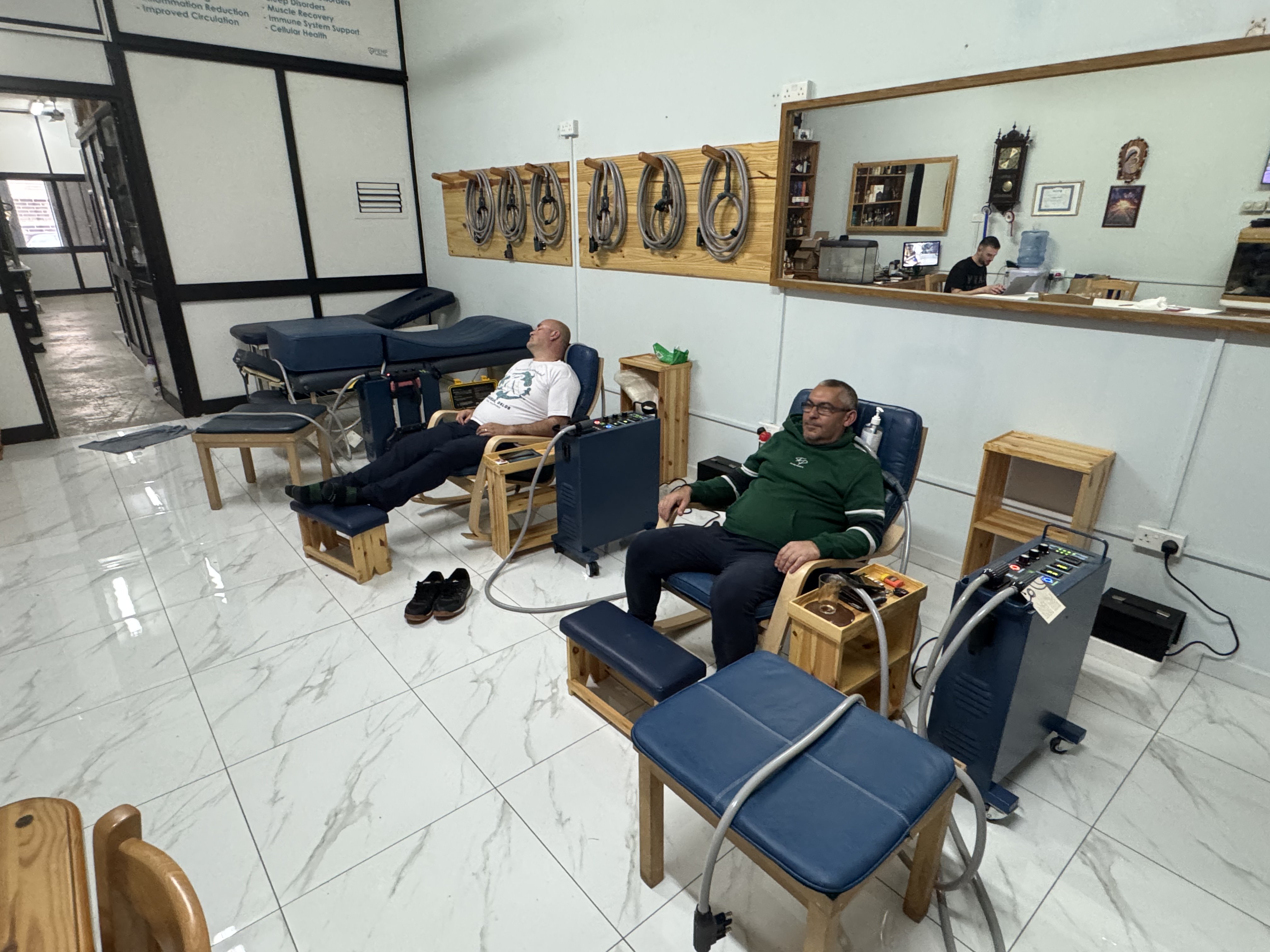 Client relaxing during PEMF therapy